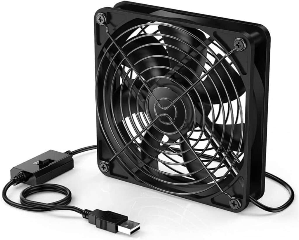 Black USB-powered fan with a square grill, featuring a simple on/off switch and a durable design for personal cooling.